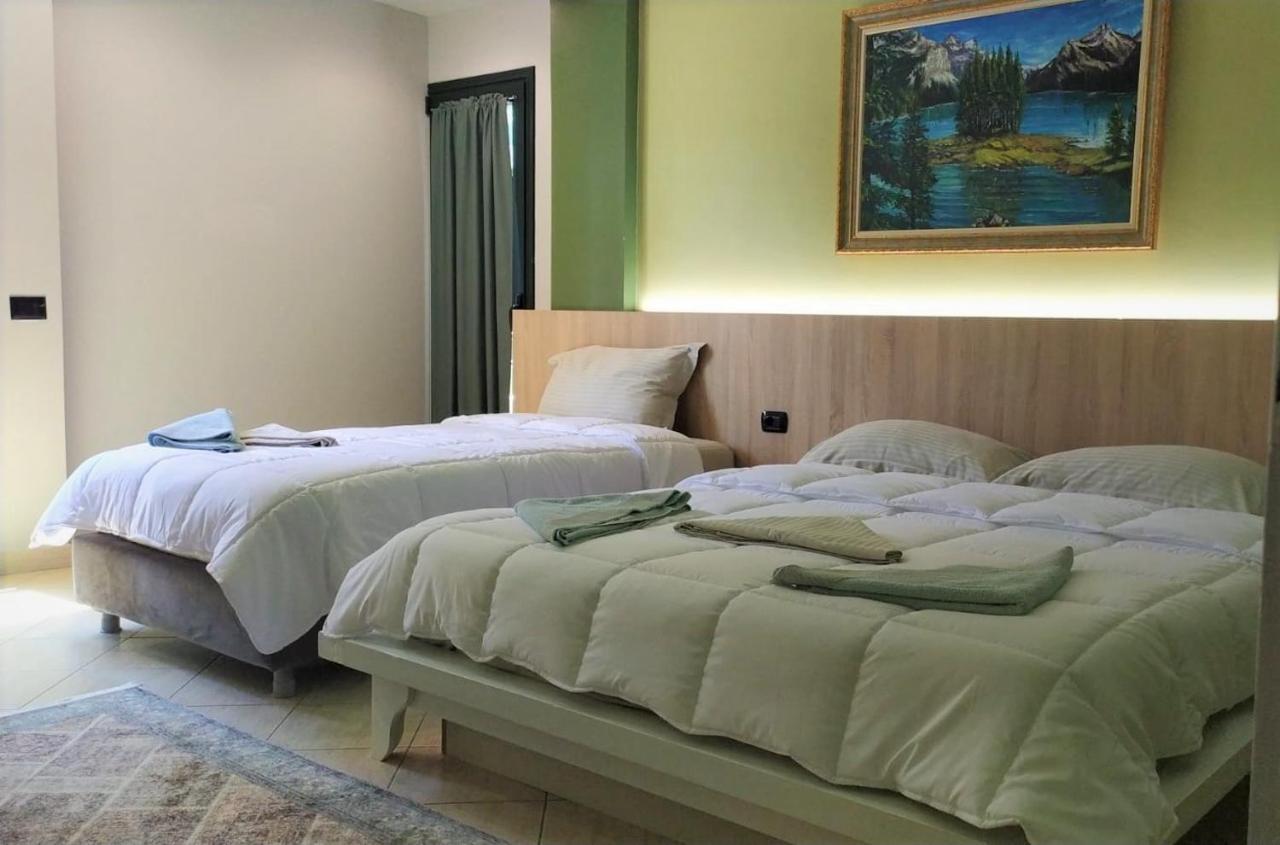 Luander Hotel Tirana Kamer foto