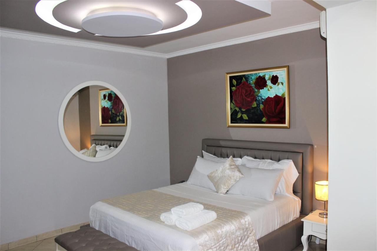 Luander Hotel Tirana Kamer foto