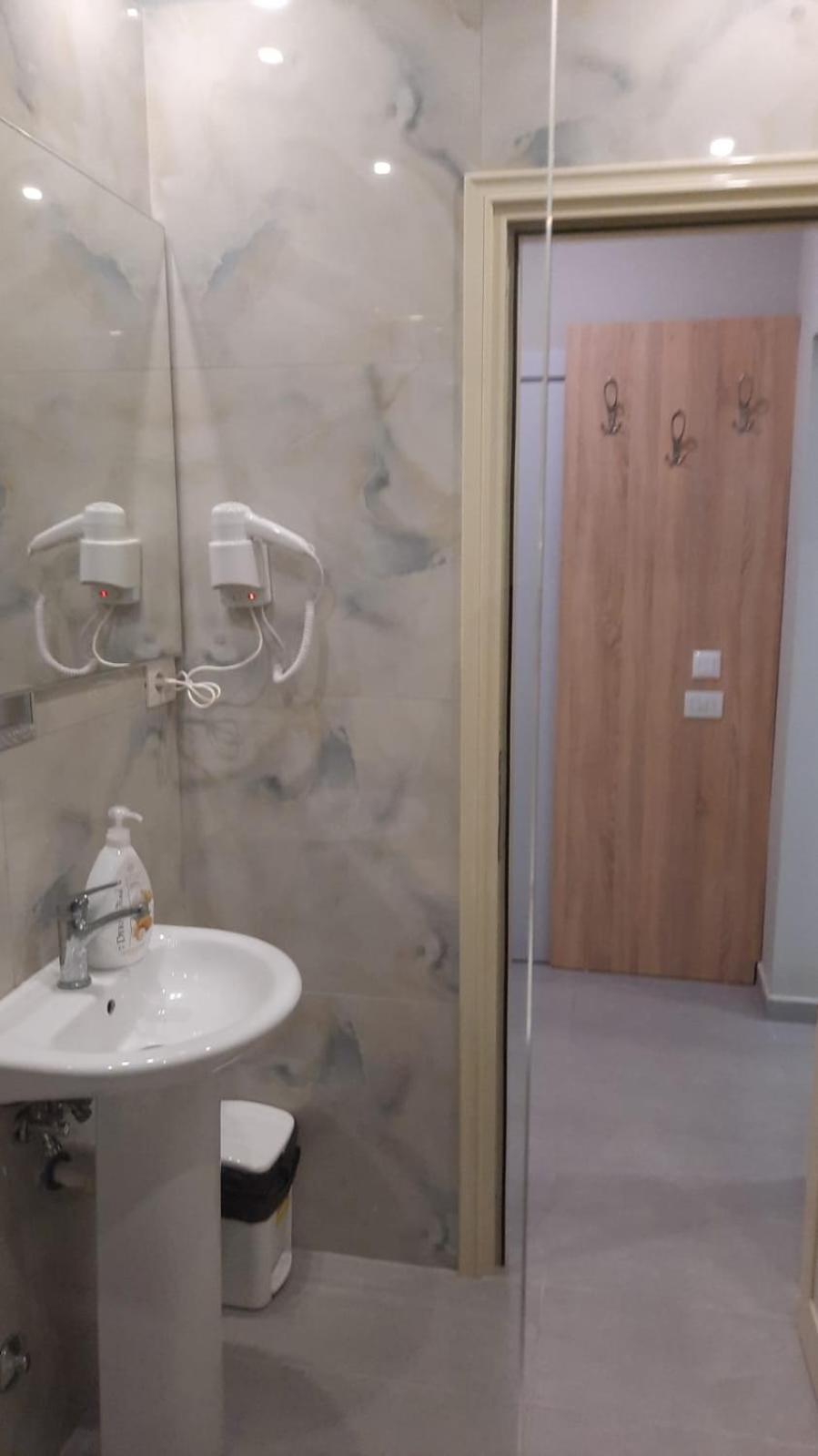 Luander Hotel Tirana Kamer foto
