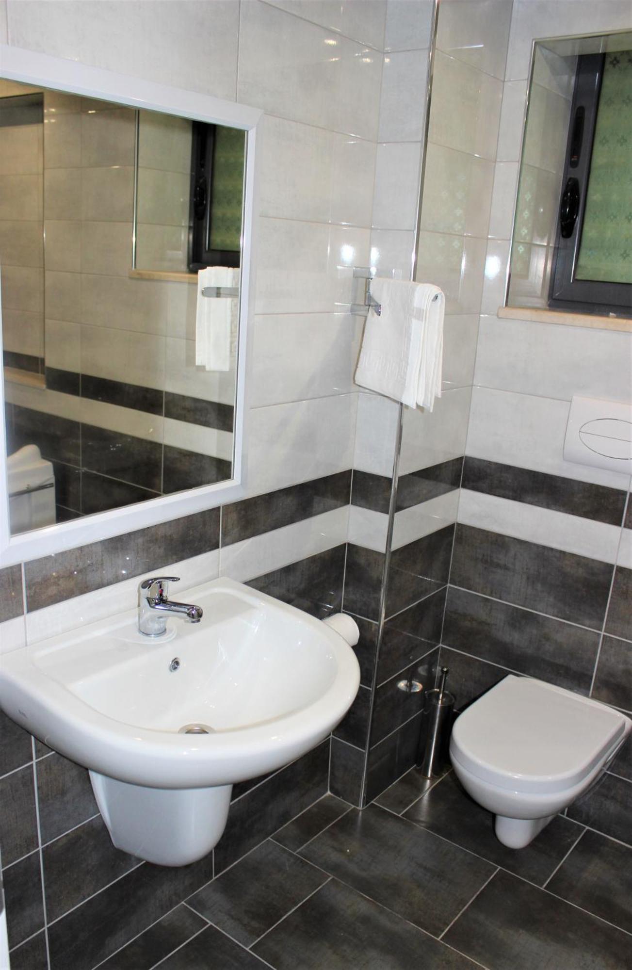 Luander Hotel Tirana Kamer foto